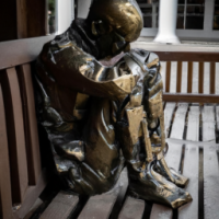 Create a realistic image of a bronze statue of a soldier sitting hunched over on a bench. His face is looking at his chest. But there is a large hole in his chest that he can see through. With this sculpture you tell the viewer that the soul of this soldier is missing.